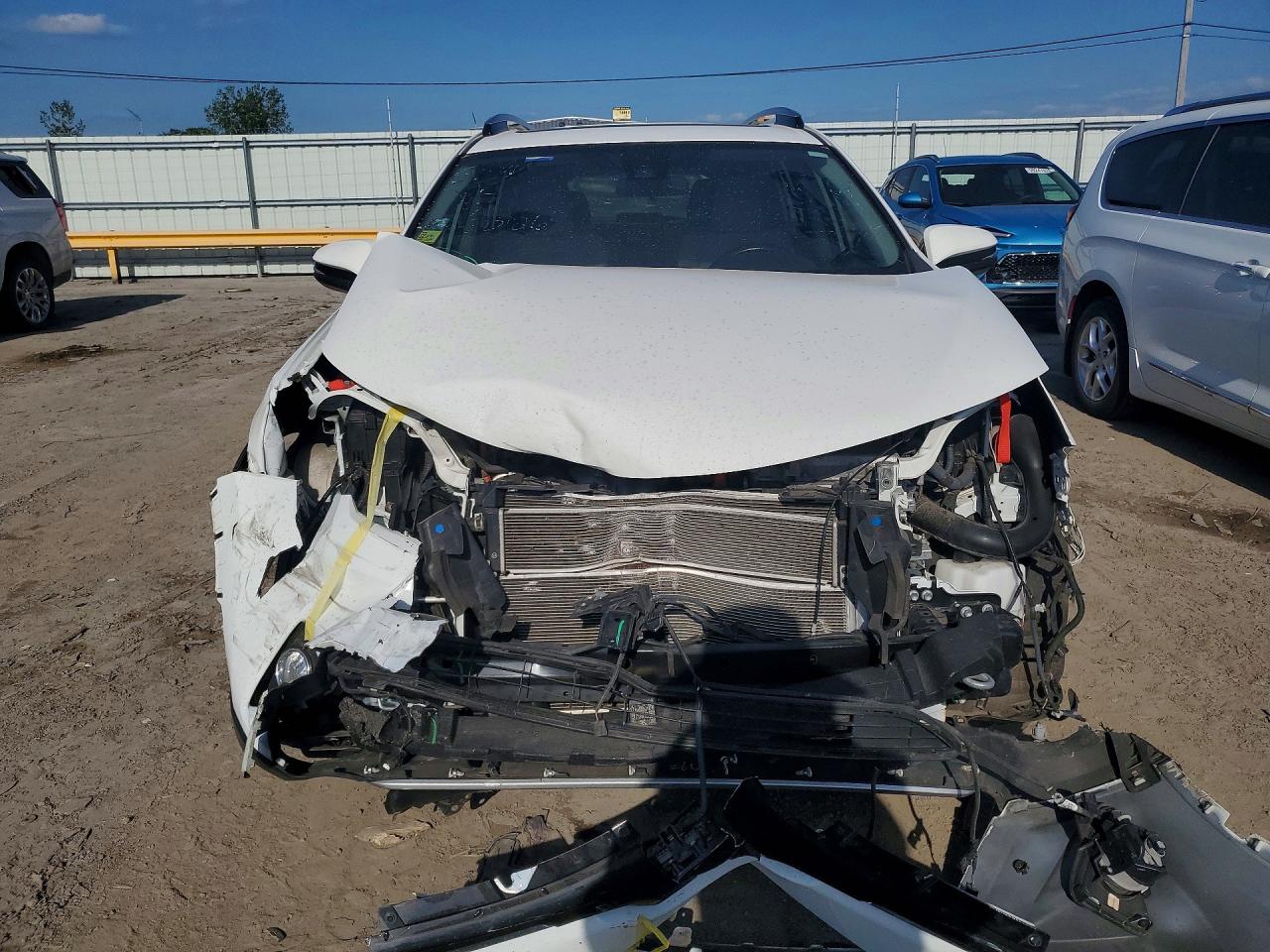 JTMRJREV6JD158009 · 2018 TOYOTA RAV4 HYBRID · 5/13
