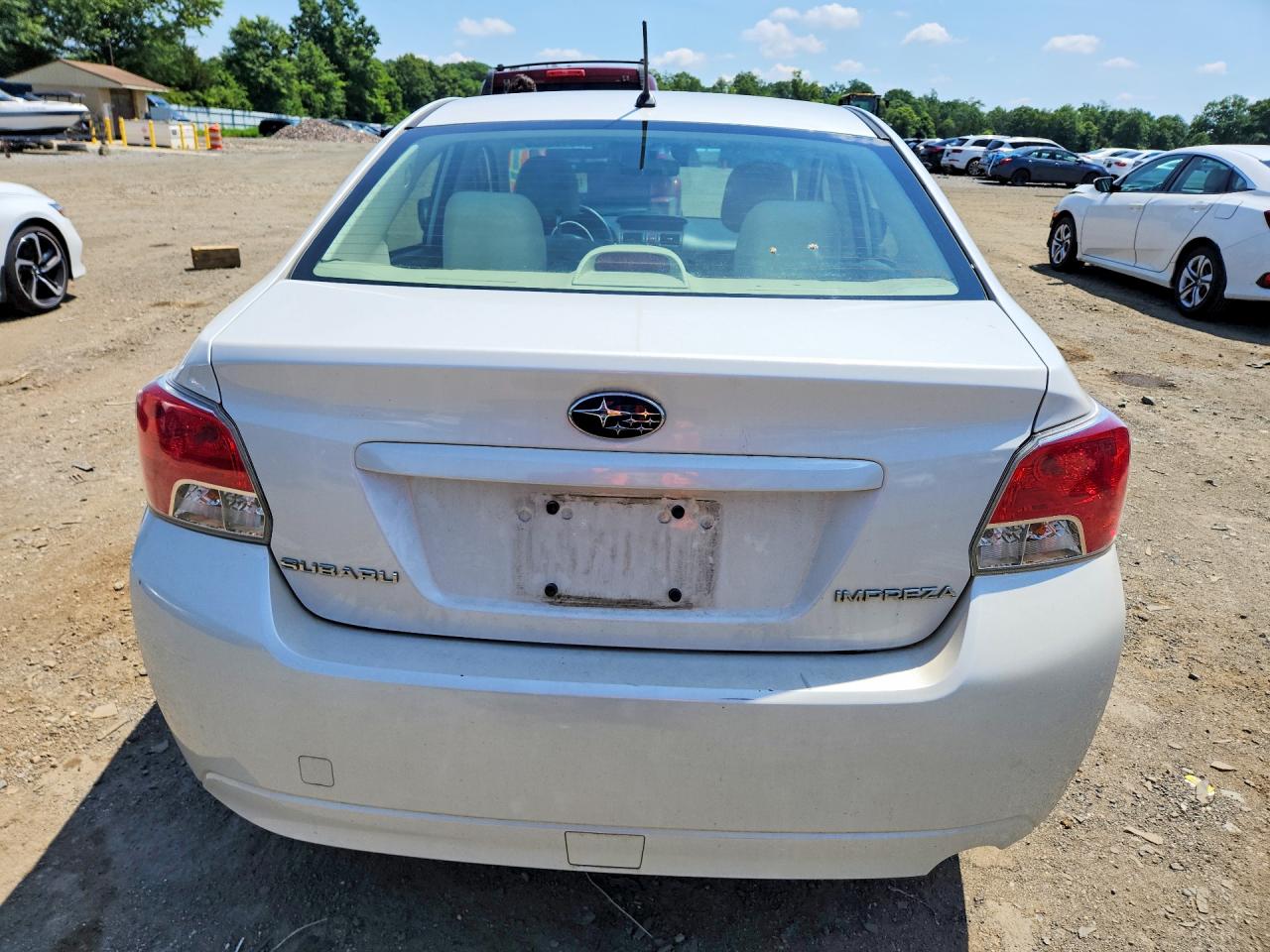 JF1GJAC60DH035104 · 2013 SUBARU IMPREZA · 6/12