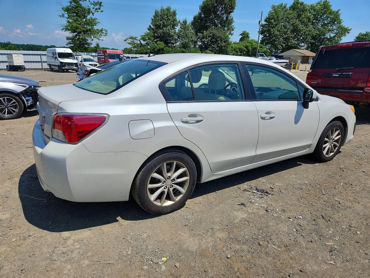 JF1GJAC60DH035104 · 2013 SUBARU IMPREZA · 3/12