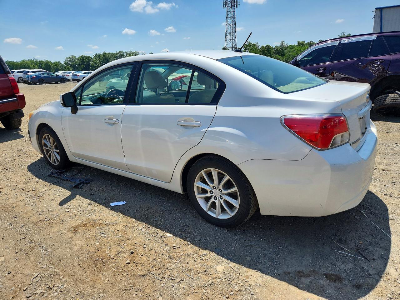 JF1GJAC60DH035104 · 2013 SUBARU IMPREZA · 2/12