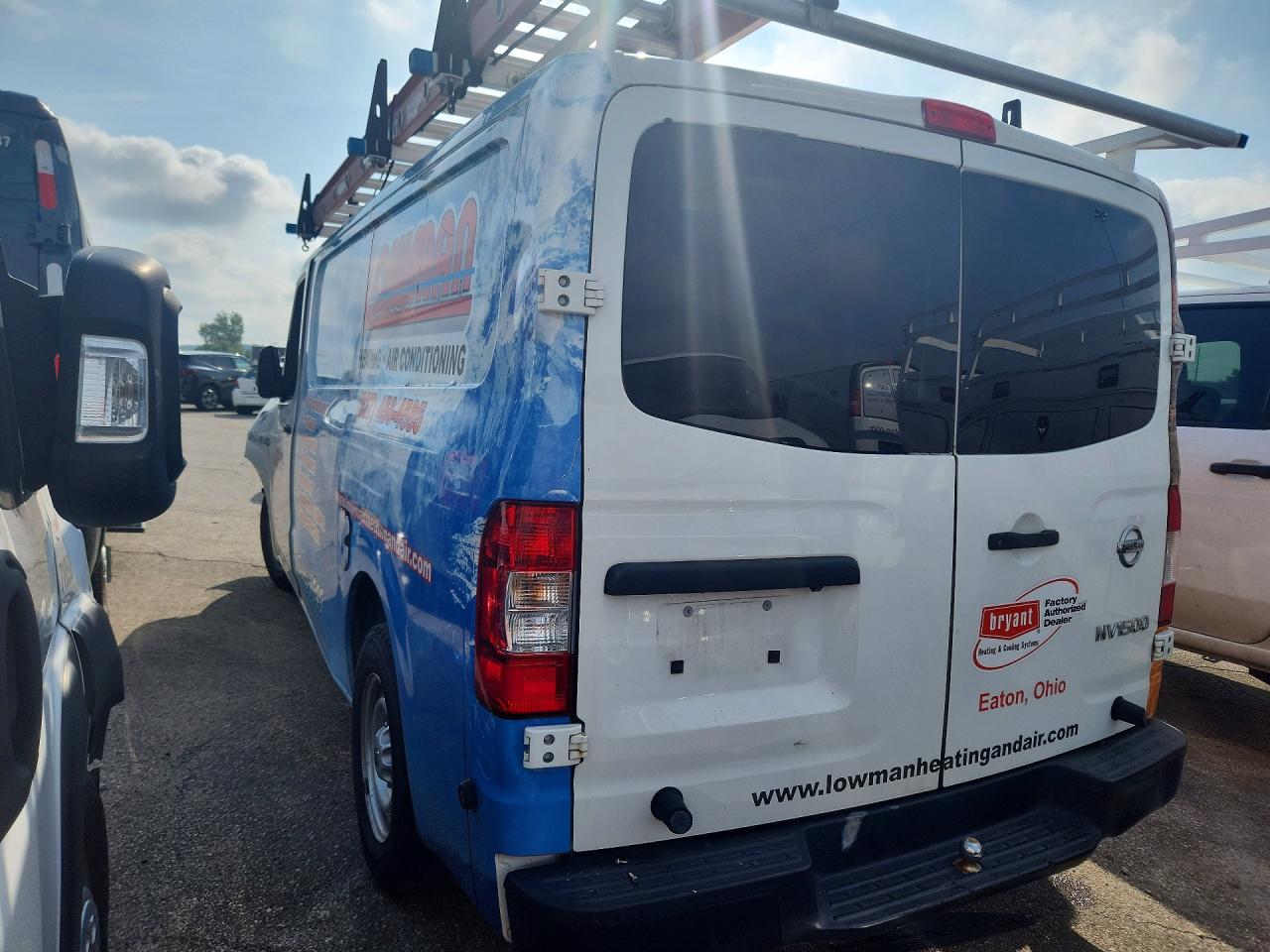 1N6BF0KM3KN800110 · 2019 NISSAN NV · 2/13