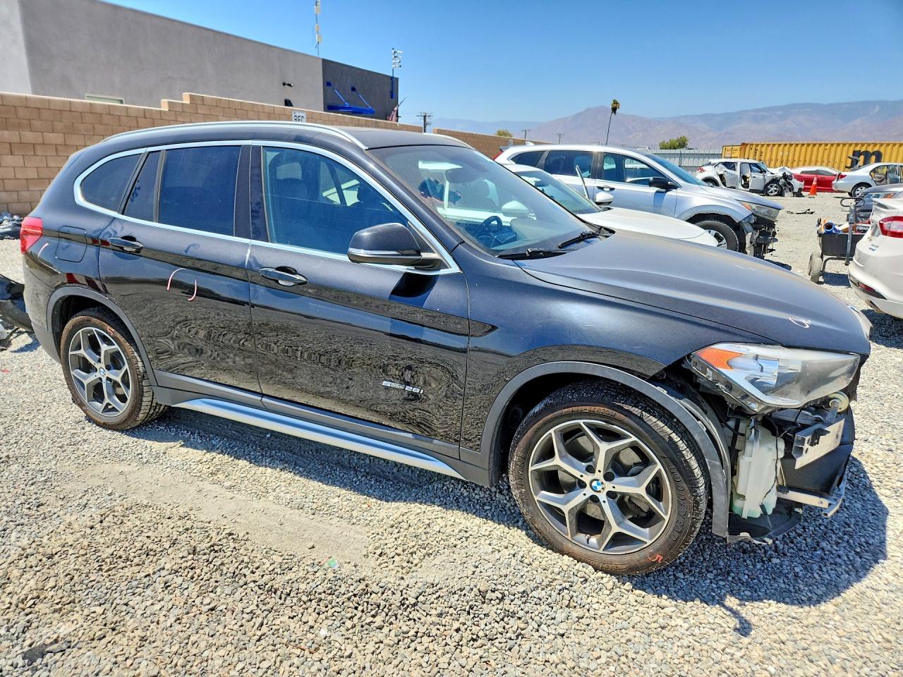 WBXHU7C34J5H40666 · 2018 BMW X1 · 4/14