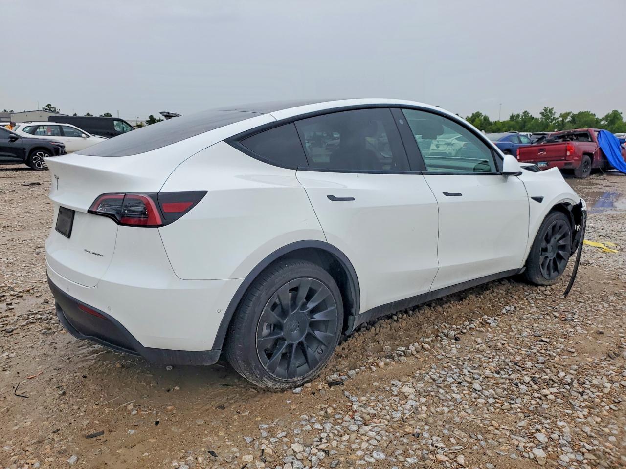 7SAYGDEEXNF387355 · 2022 TESLA MODEL Y · 3/13