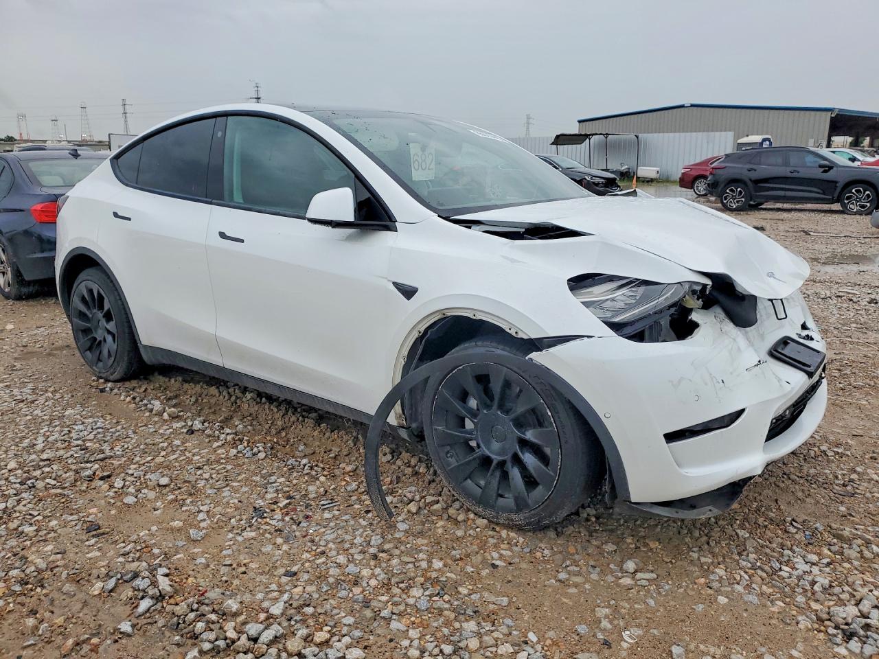 7SAYGDEEXNF387355 · 2022 TESLA MODEL Y · 4/13