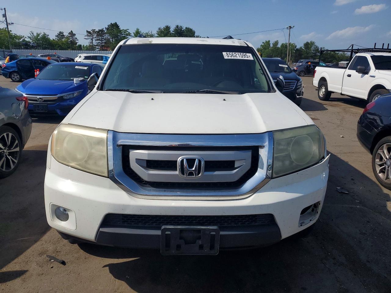 5FNYF4H47BB064900 · 2011 HONDA PILOT · 5/12