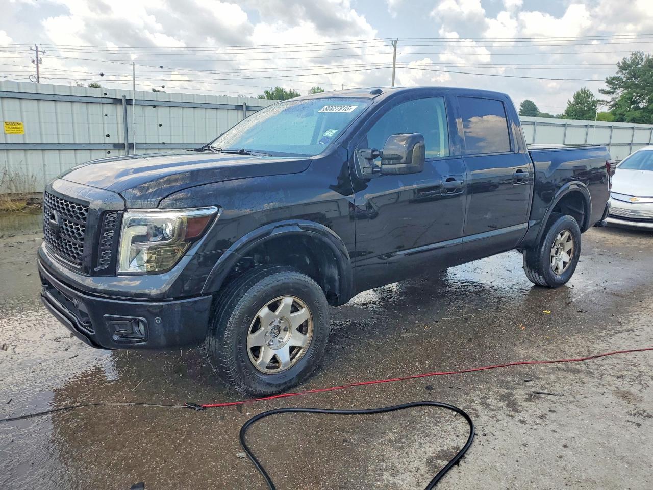 1N6AA1E58JN518760 · 2018 NISSAN TITAN