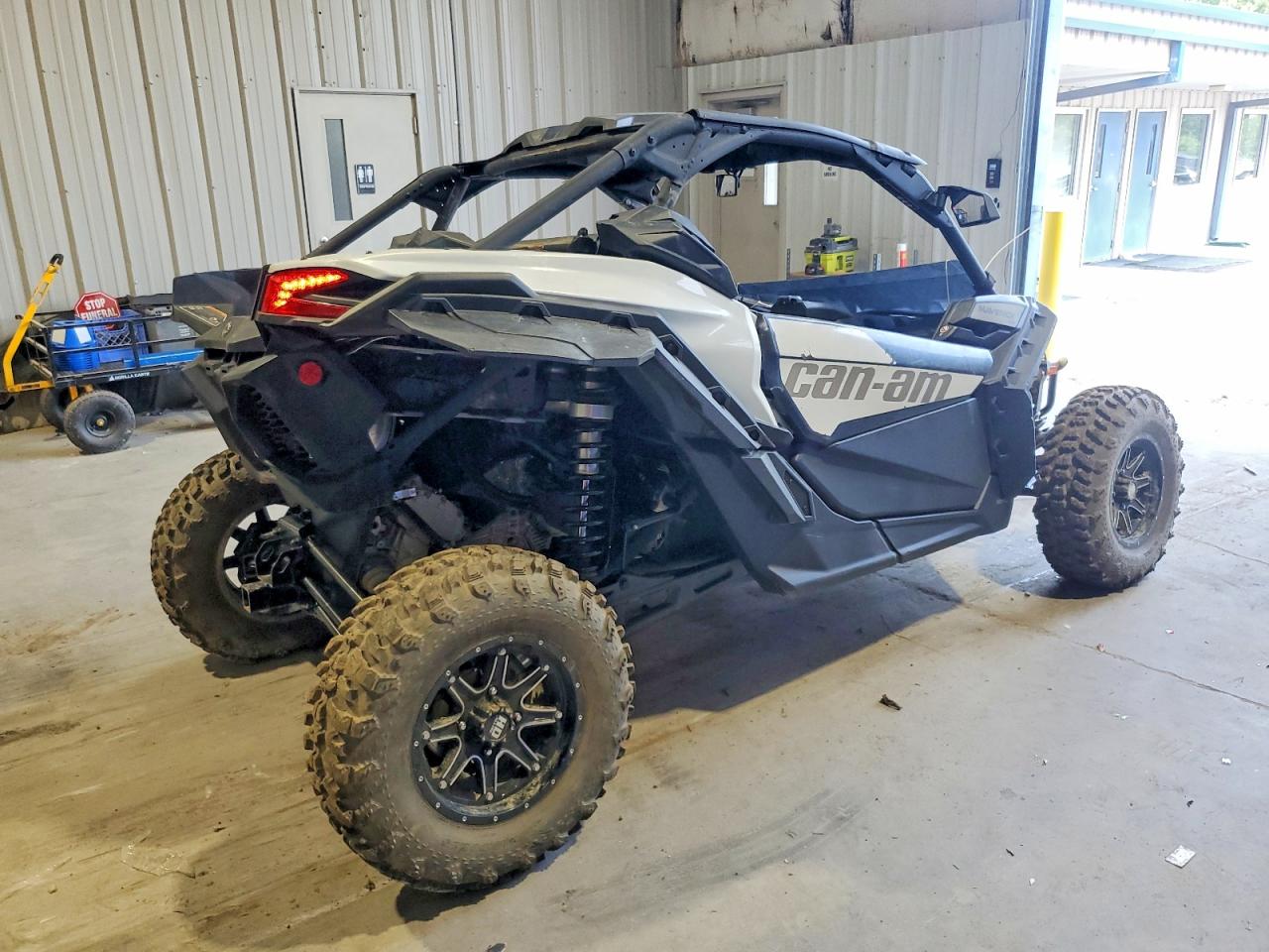 3JBVGAV42PE002338 · 2023 CAN-AM MAVERICK X3 · 4/10