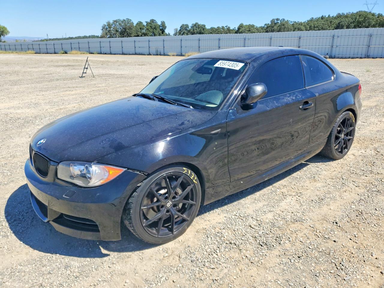 WBAUC9C53BVM10704 · 2011 BMW 135