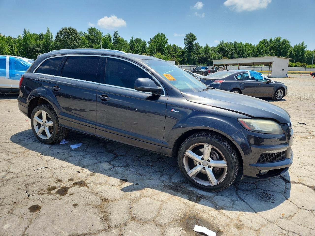 WA1DGBFE1BD002809 · 2011 AUDI Q7 · 4/13