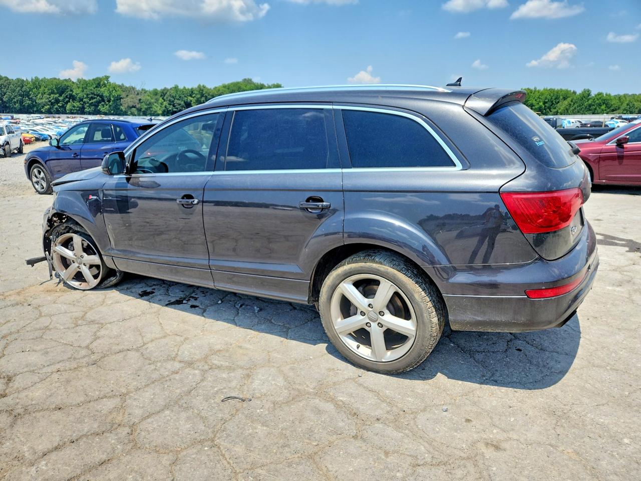 WA1DGBFE1BD002809 · 2011 AUDI Q7 · 2/13