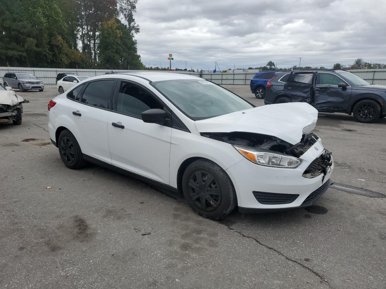 1FADP3E2XJL261084 · 2018 FORD FOCUS · 4/12