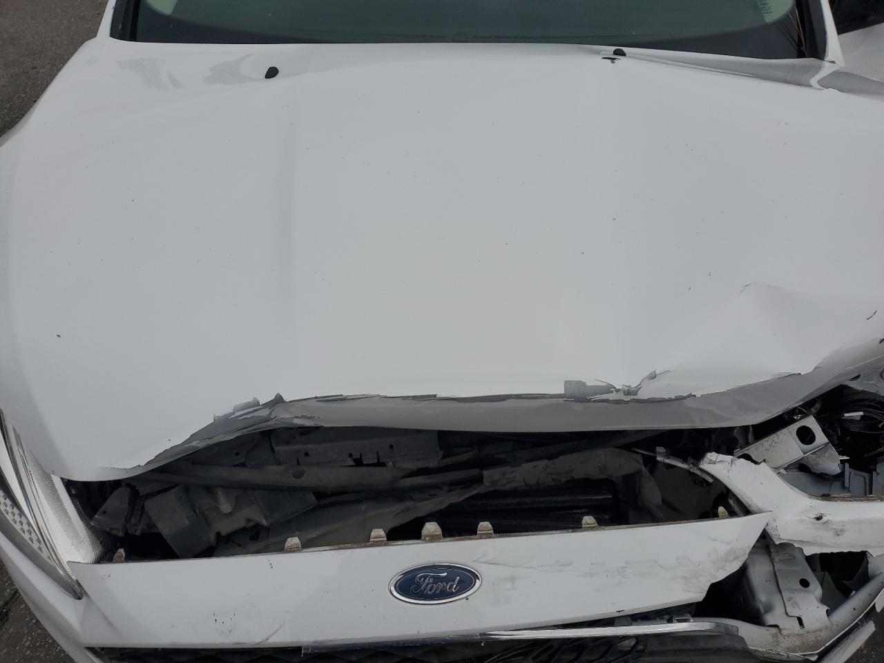 1FADP3E2XJL261084 · 2018 FORD FOCUS · 11/12