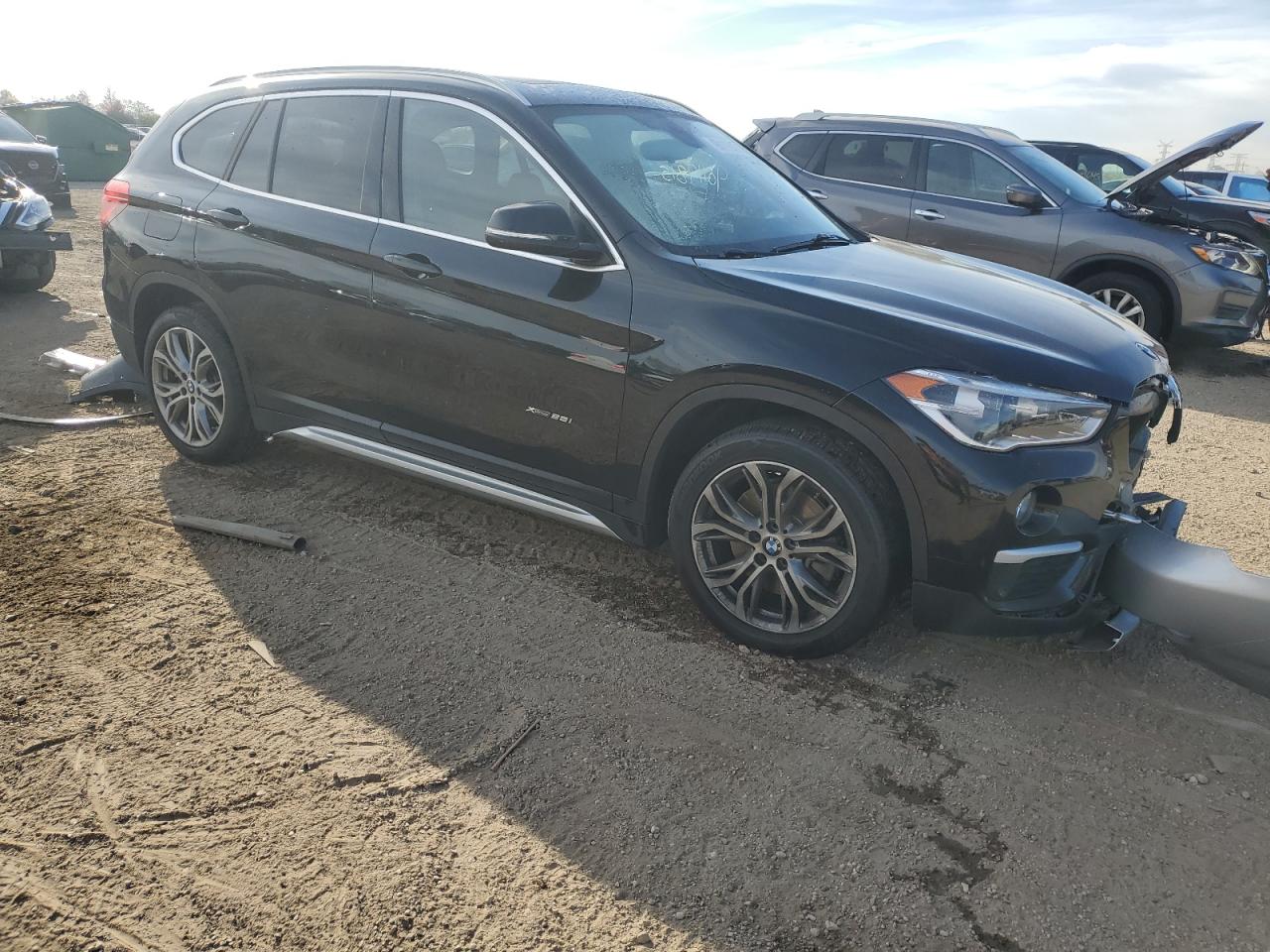 WBXHT3C36H5F84569 · 2017 BMW X1 · 4/13