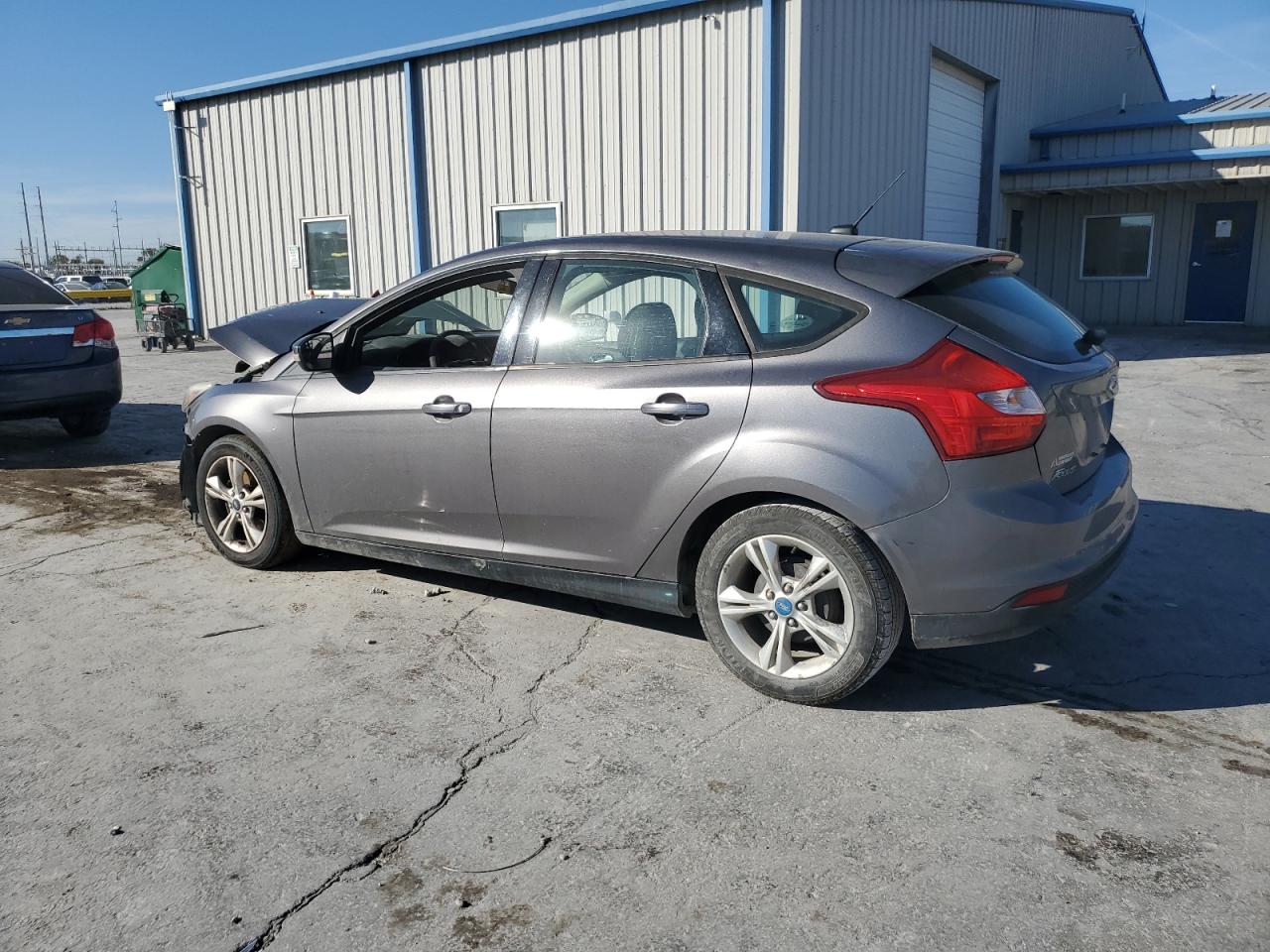 1FADP3K25EL199801 · 2014 FORD FOCUS · 2/12