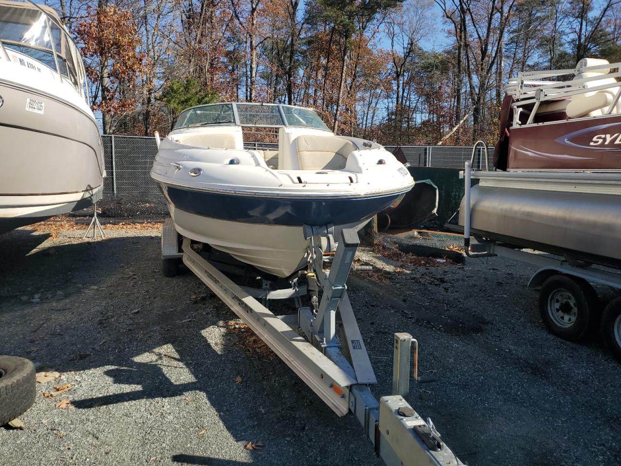 SERV1258G102 · 2002 SEA RAY BAOT · 9/10