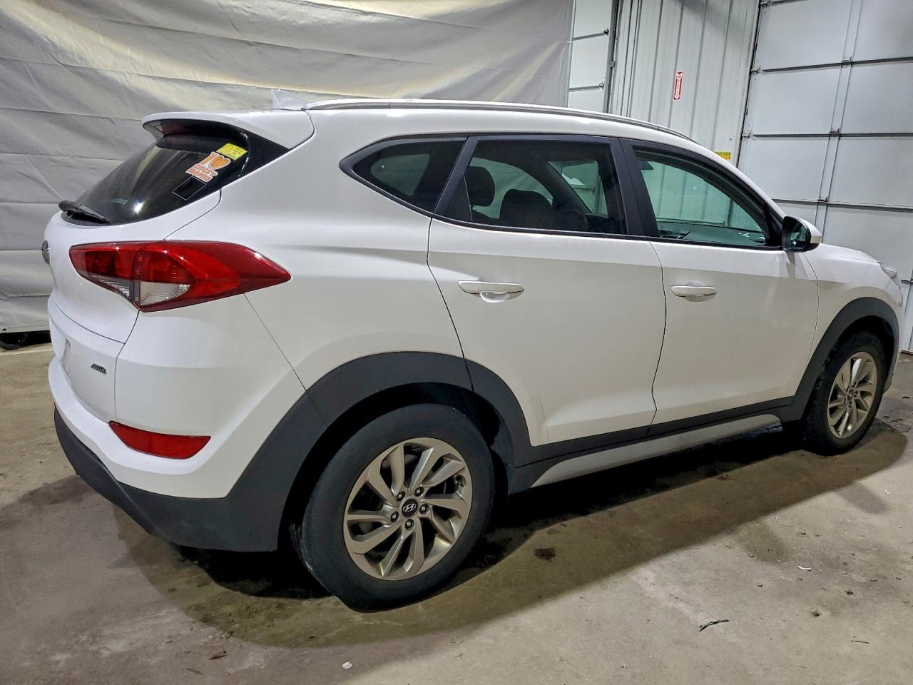 KM8J3CA41JU684688 · 2018 HYUNDAI TUCSON · 3/13