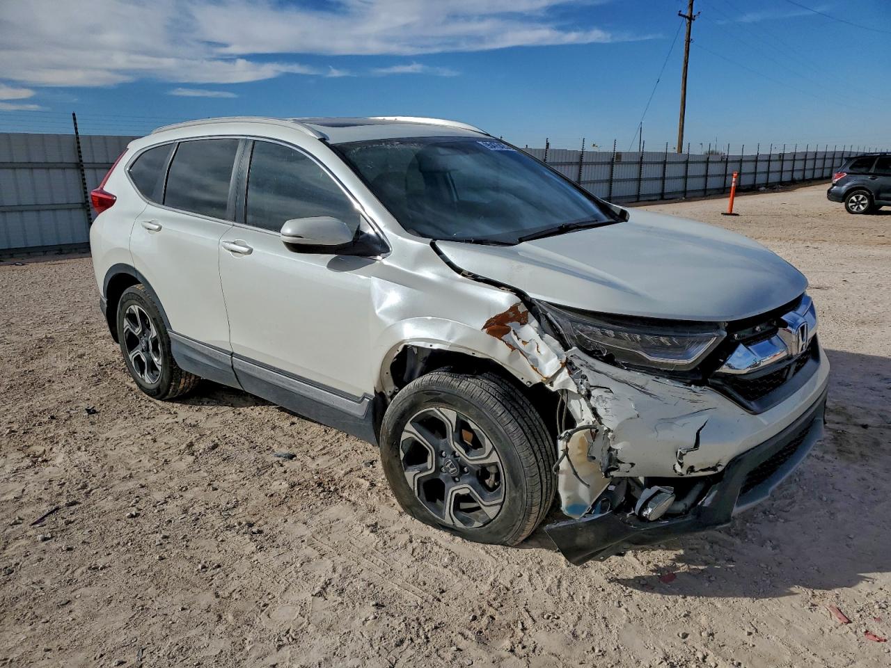 2HKRW2H96JH600997 · 2018 HONDA CR-V · 4/13
