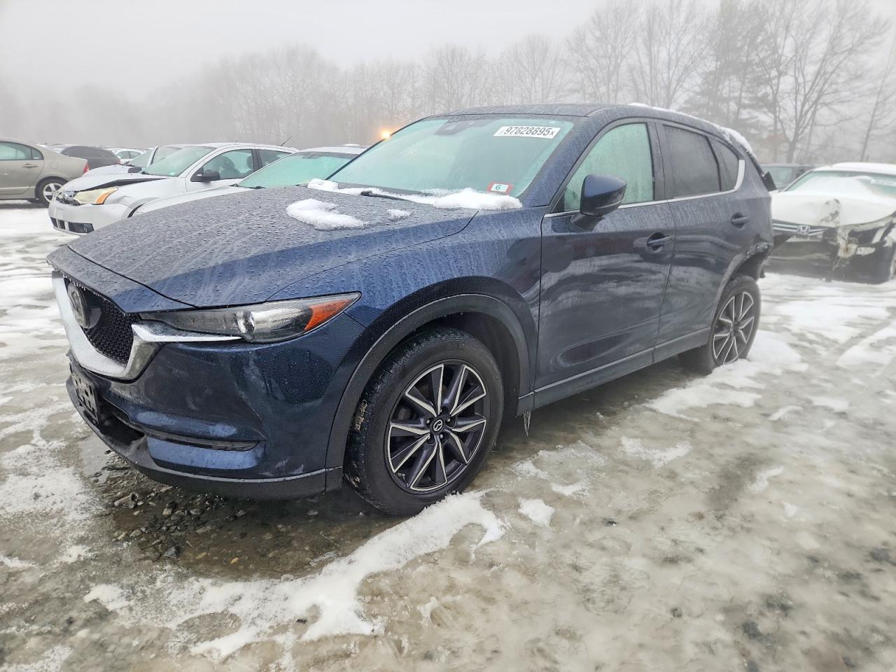 JM3KFBCM9J0469940 · 2018 MAZDA CX-5