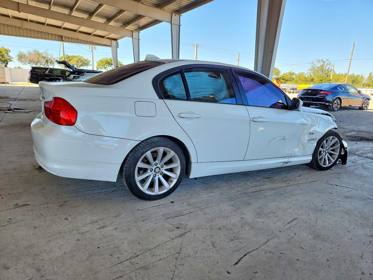 WBAPH7G59BNM57734 · 2011 BMW 328 · 3/12