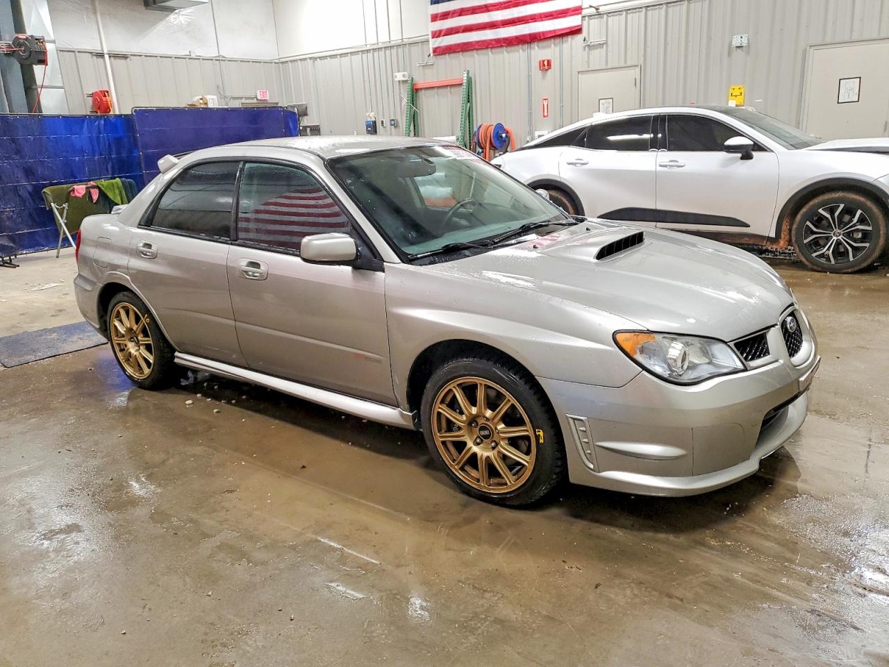JF1GD70636L508153 · 2006 SUBARU IMPREZA · 4/12