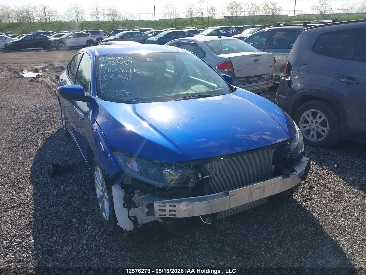 2HGFC2F52KH008746 · 2019 HONDA CIVIC LX