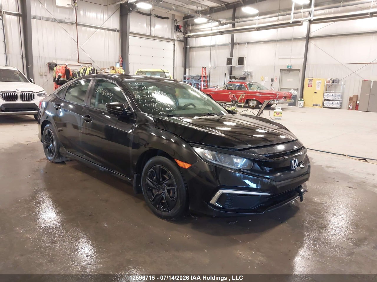 2HGFC2F51MH014914 · 2021 HONDA CIVIC LX