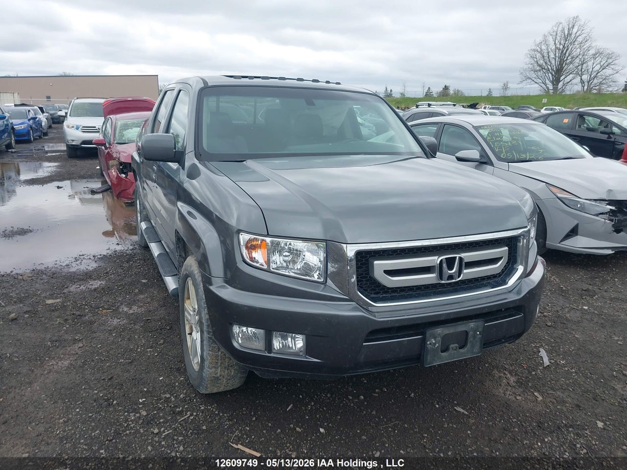 5FPYK1F56BB502609 · 2011 HONDA RIDGELINE RTL