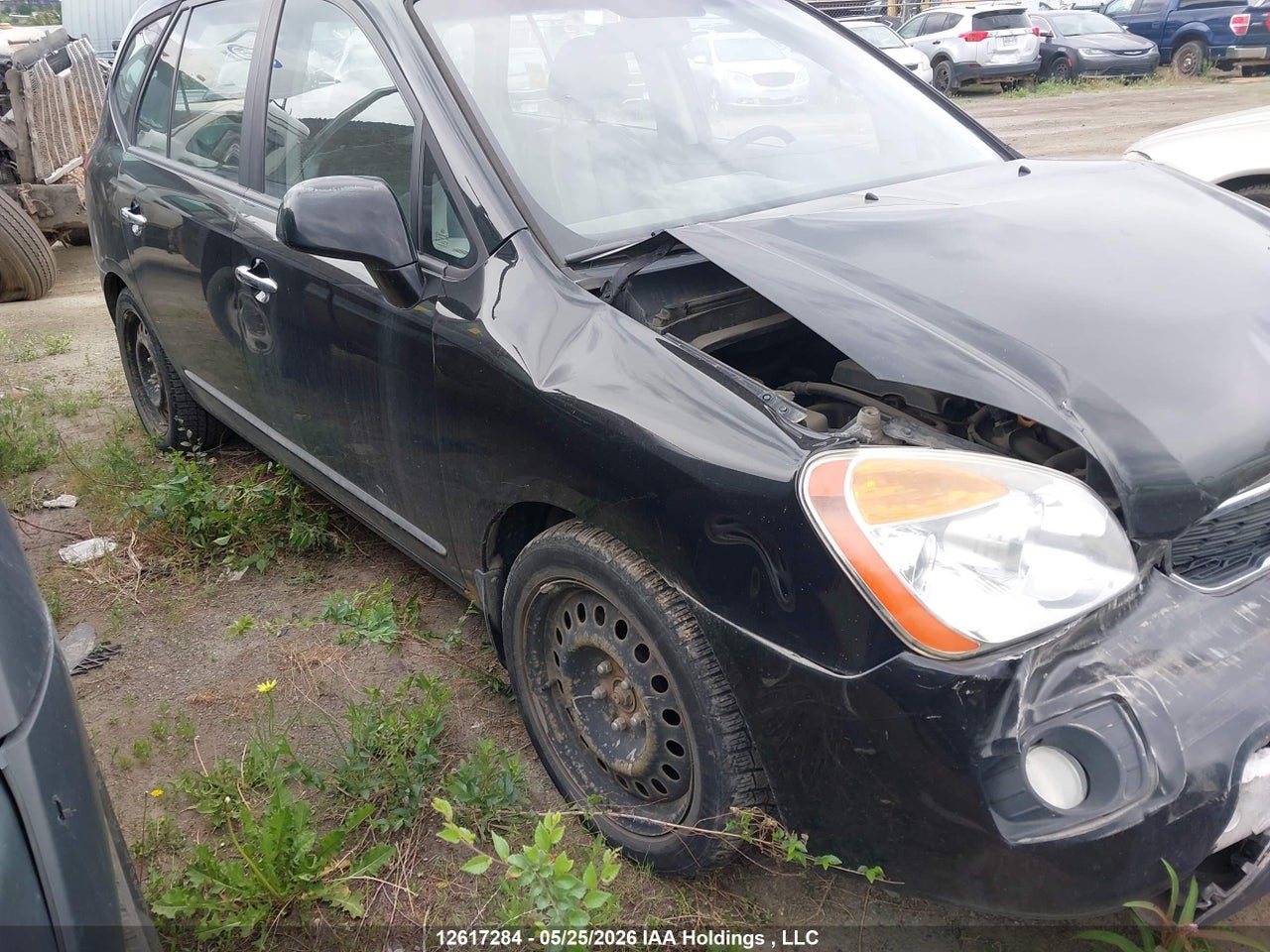 KNAHH8C81C7404770 · 2012 KIA RONDO