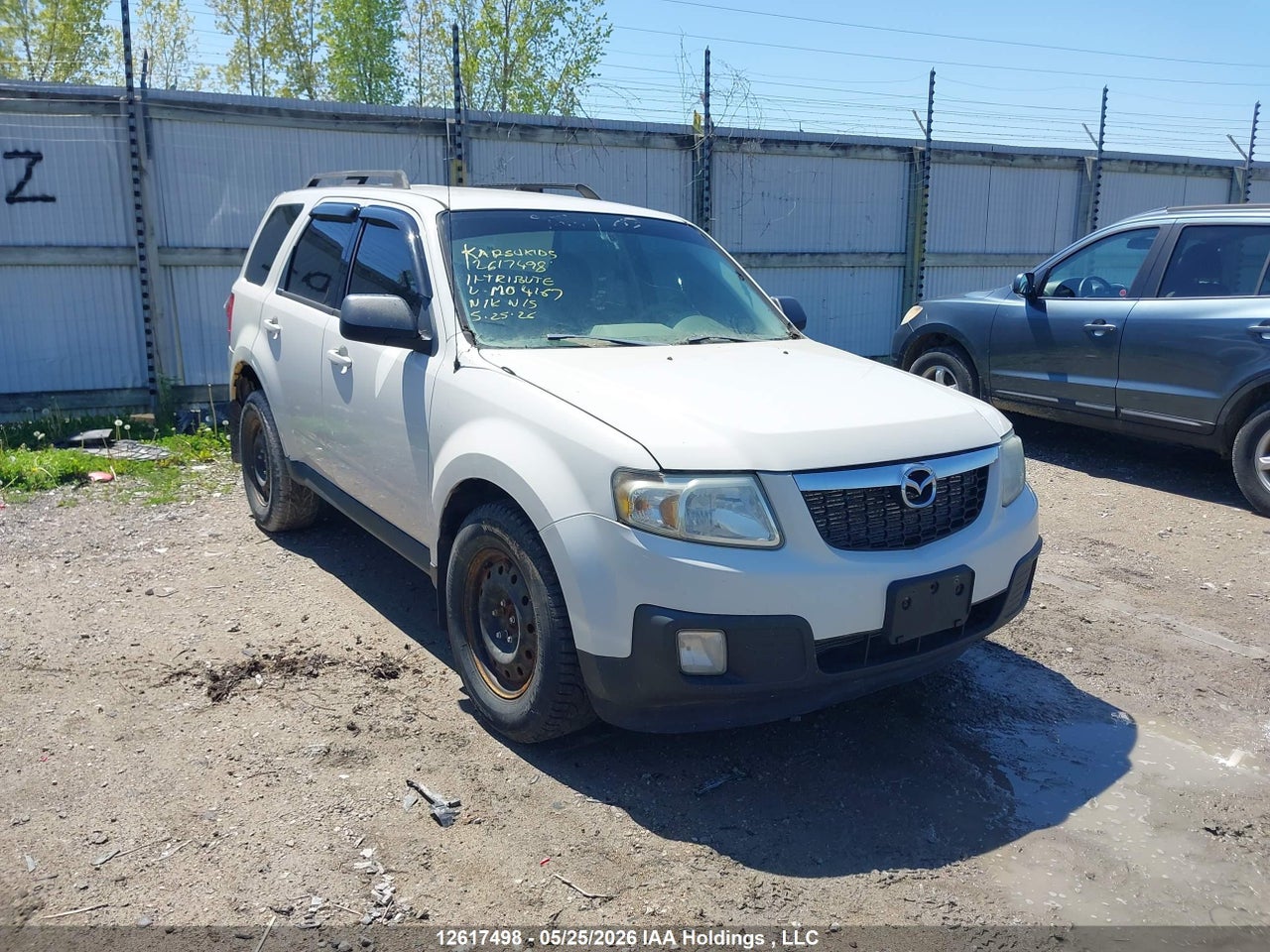 4F2CY0C78BKM04167 · 2011 MAZDA TRIBUTE