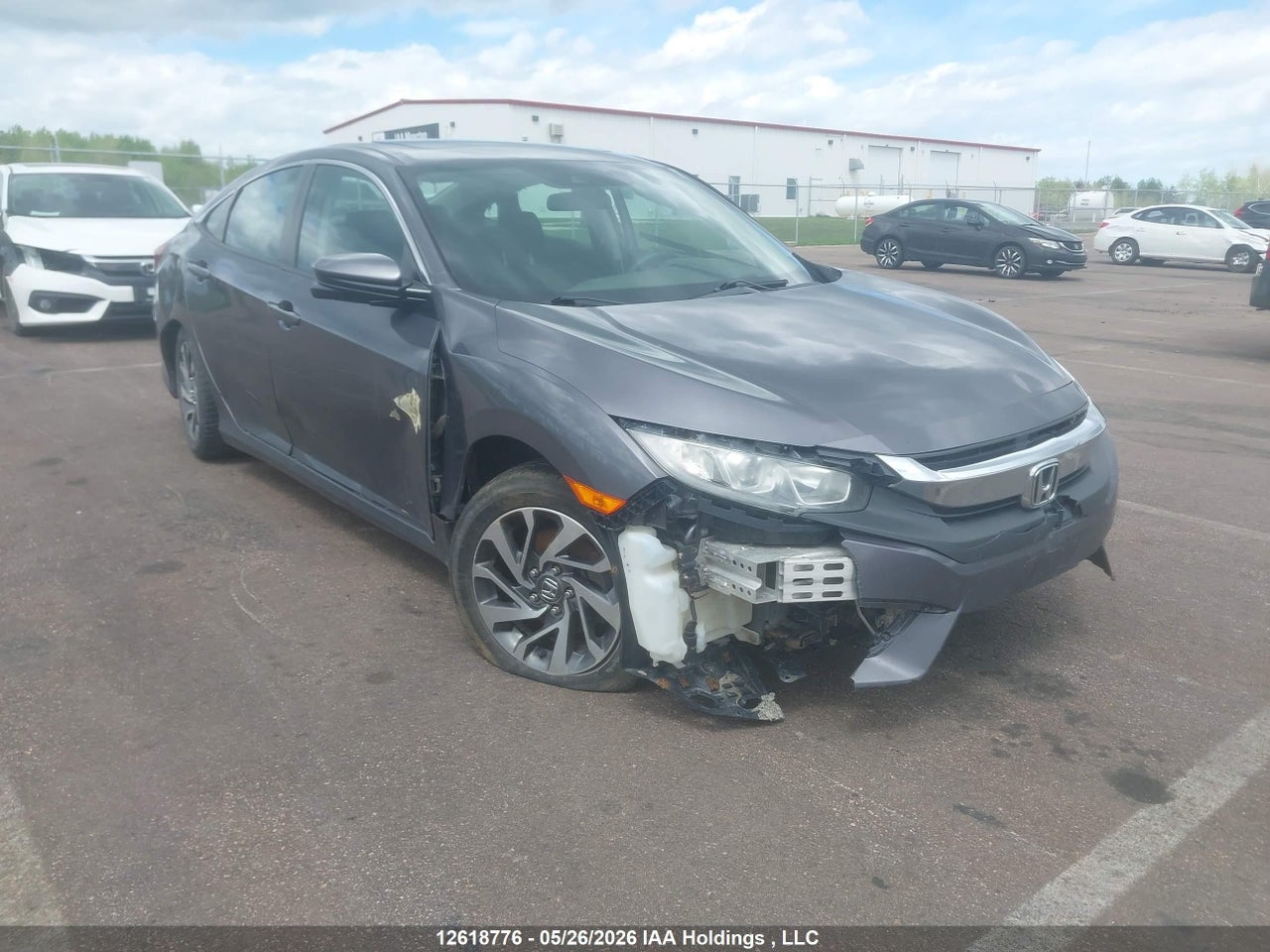 2HGFC2F82GH037925 · 2016 HONDA CIVIC EX