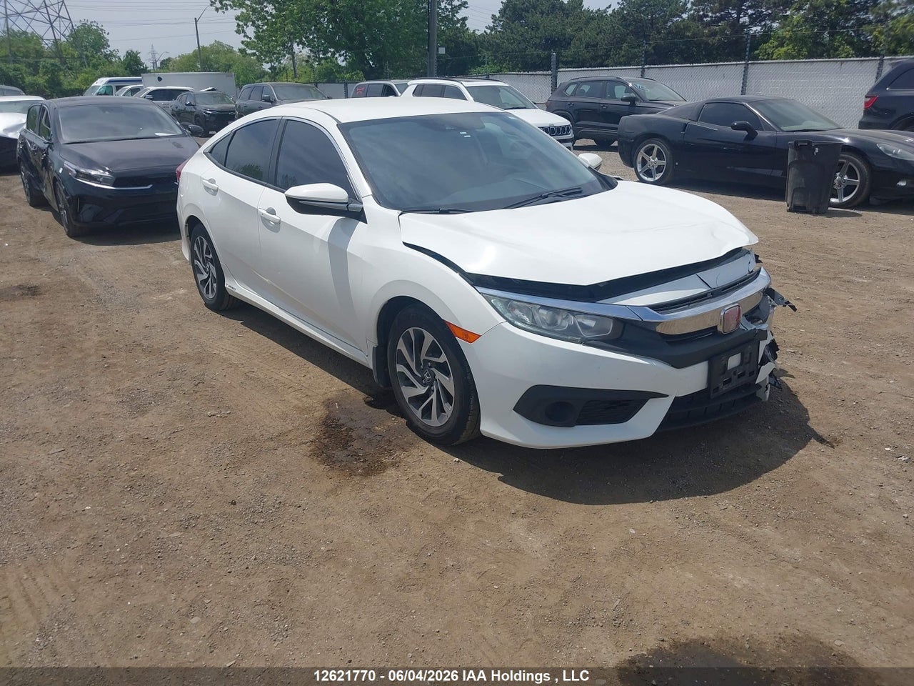 2HGFC2F60JH015797 · 2018 HONDA CIVIC LX