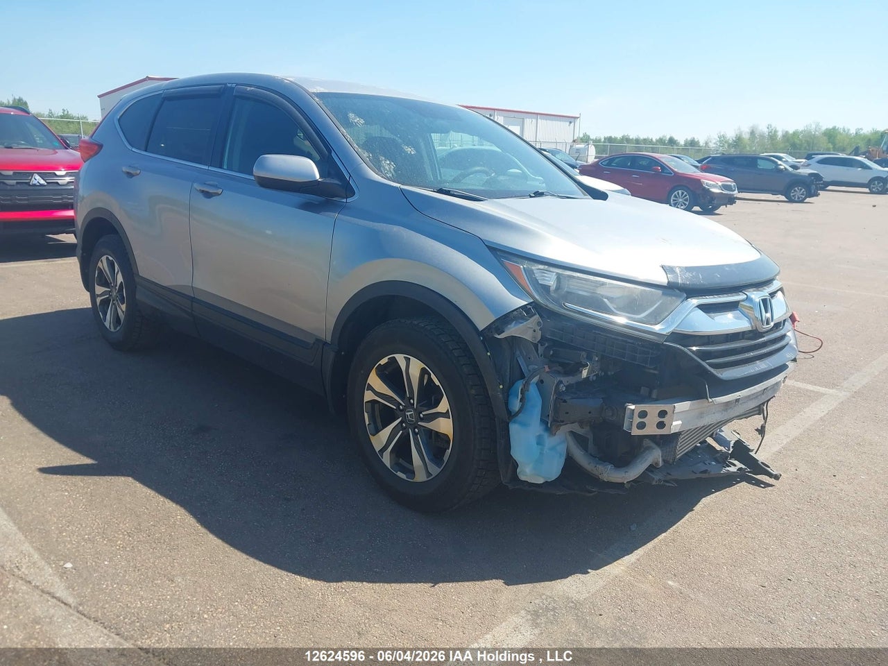 2HKRW1H37JH000687 · 2018 HONDA CR-V LX