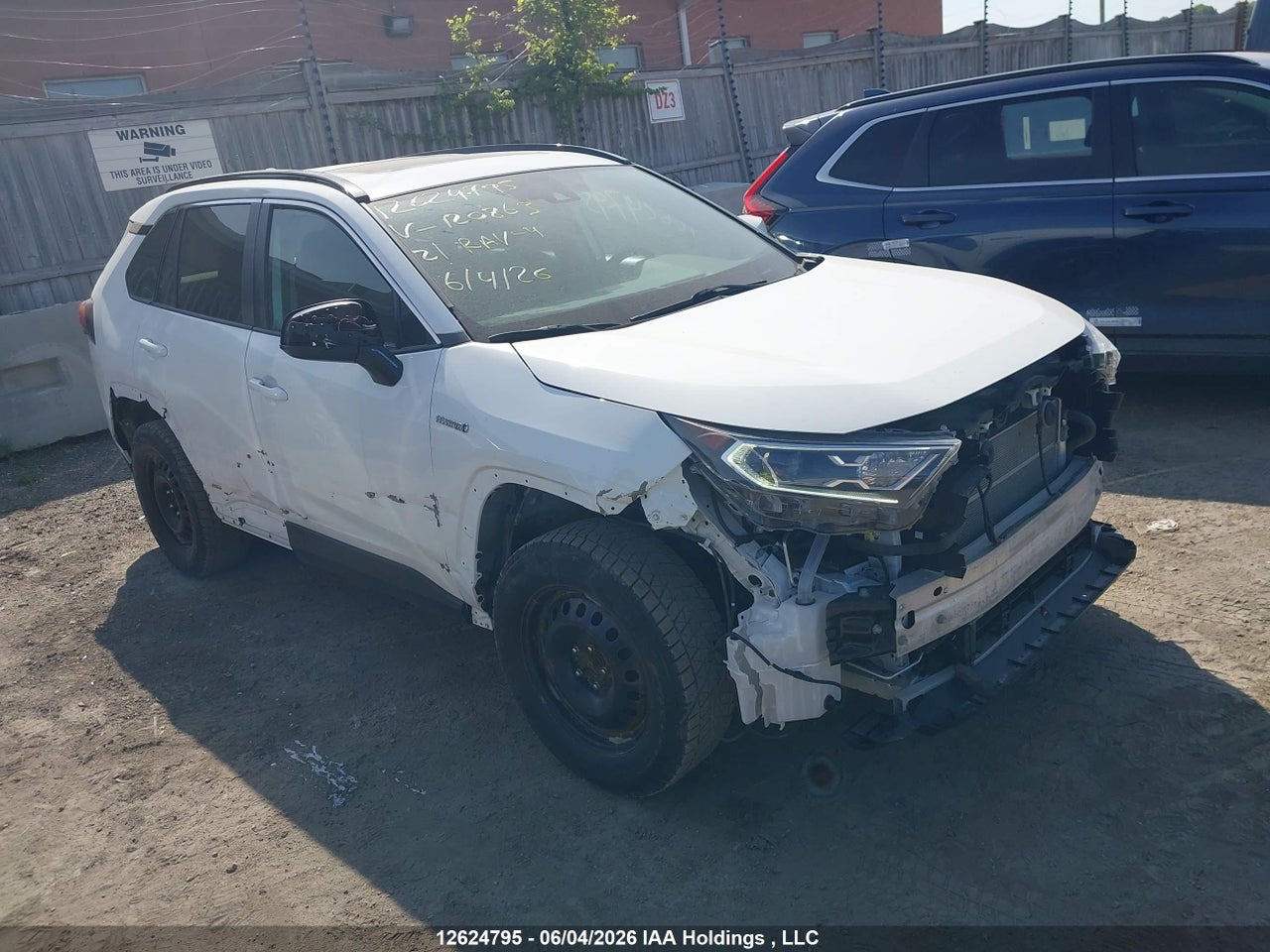 2T3RWRFV9MW120863 · 2021 TOYOTA RAV4 HYBRID XLE