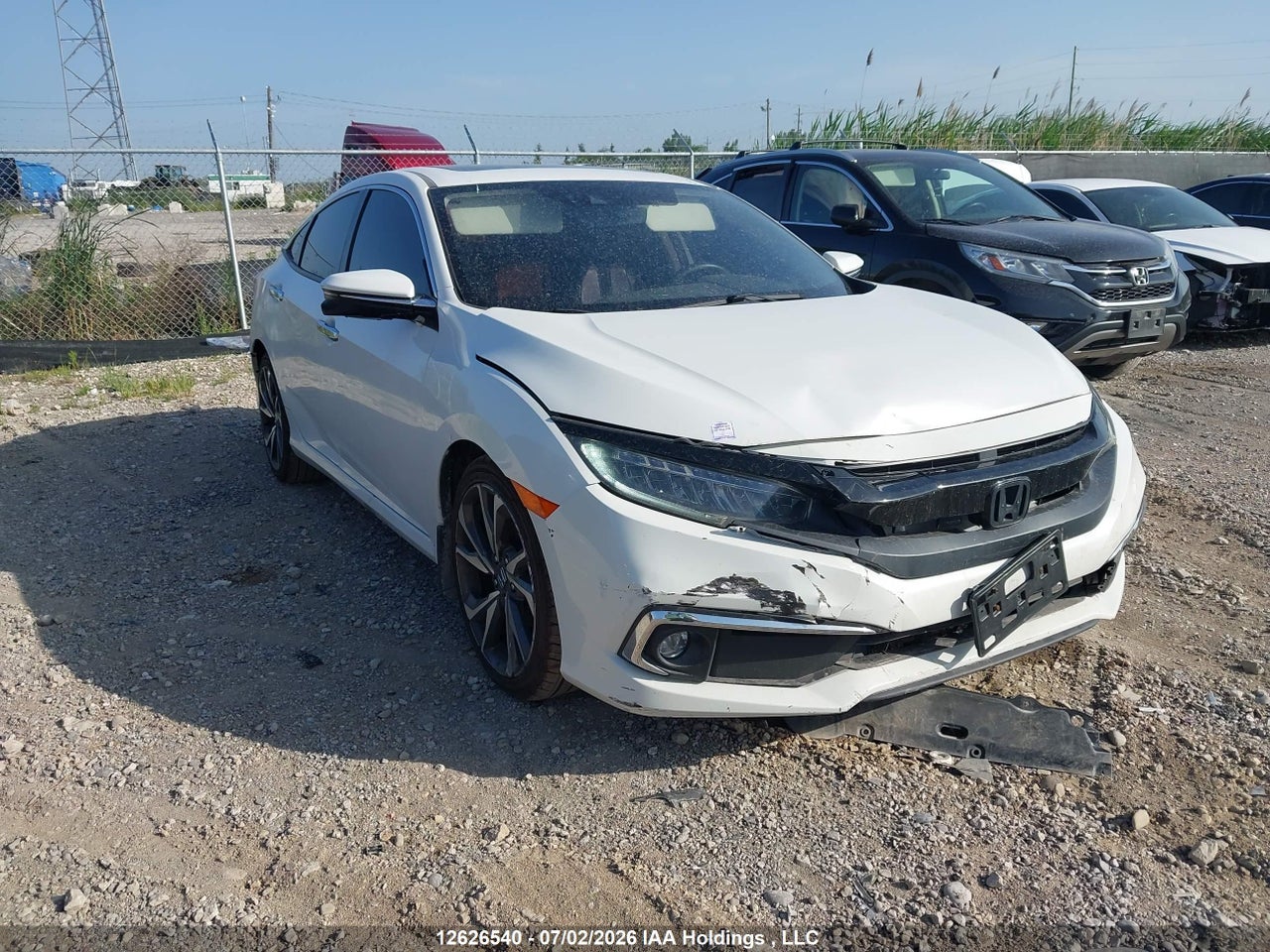 2HGFC1F9XKH104878 · 2019 HONDA Civic touring