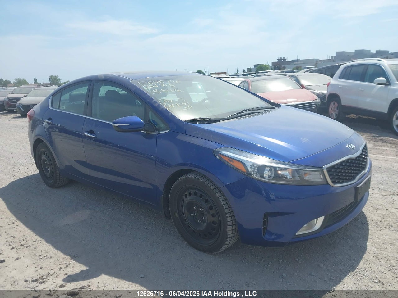 3KPFL4A87JE221715 · 2018 KIA FORTE EX