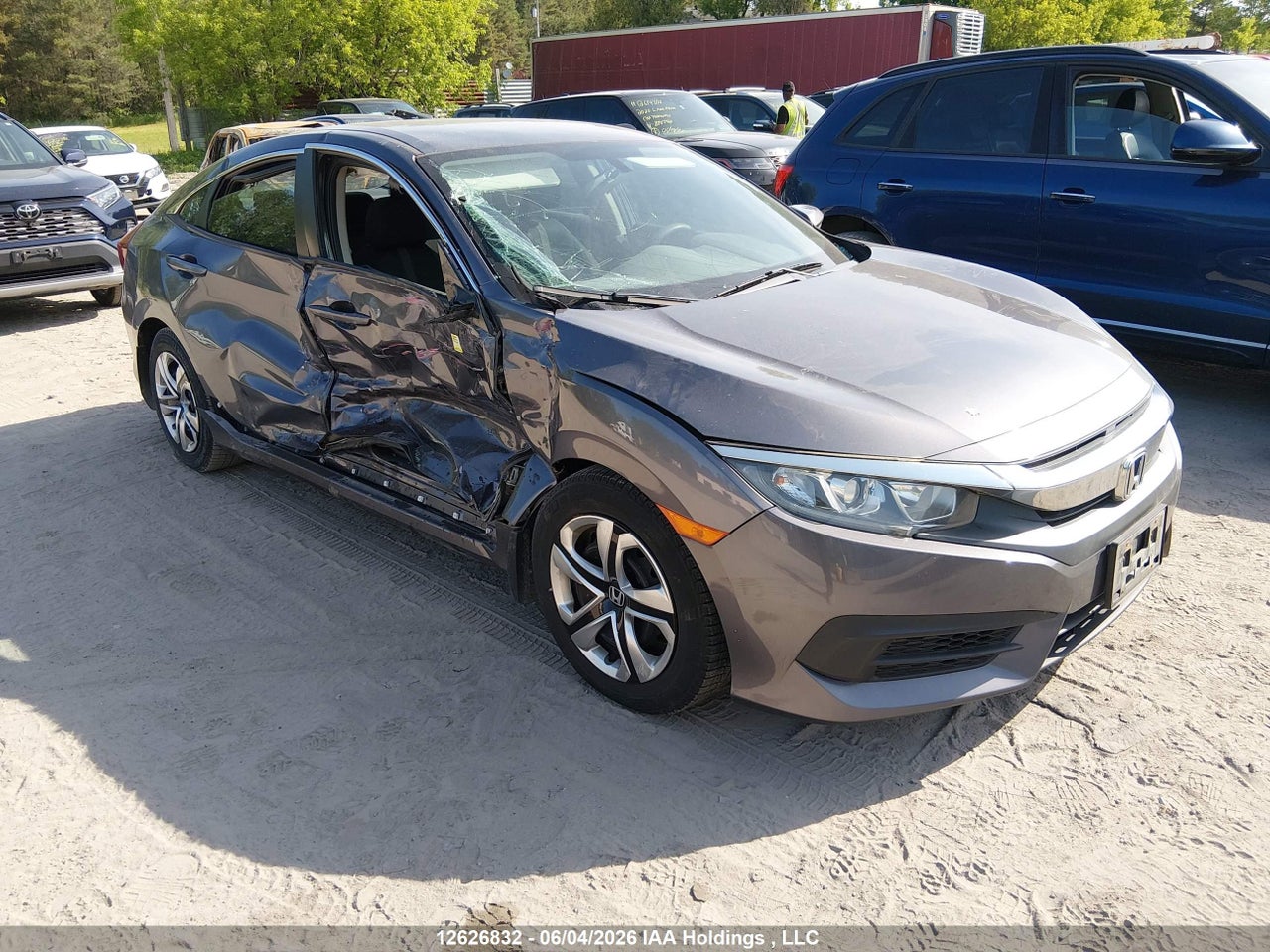 2HGFC2F57JH003329 · 2018 HONDA CIVIC LX