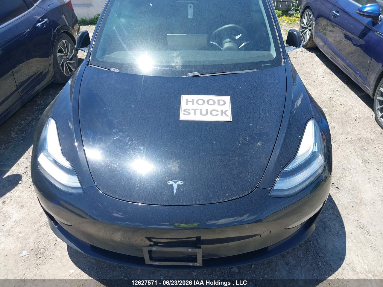 5YJ3E1EA6JF171361 · 2018 TESLA MODEL 3 LONG RANGE/MID RANGE · 9/18
