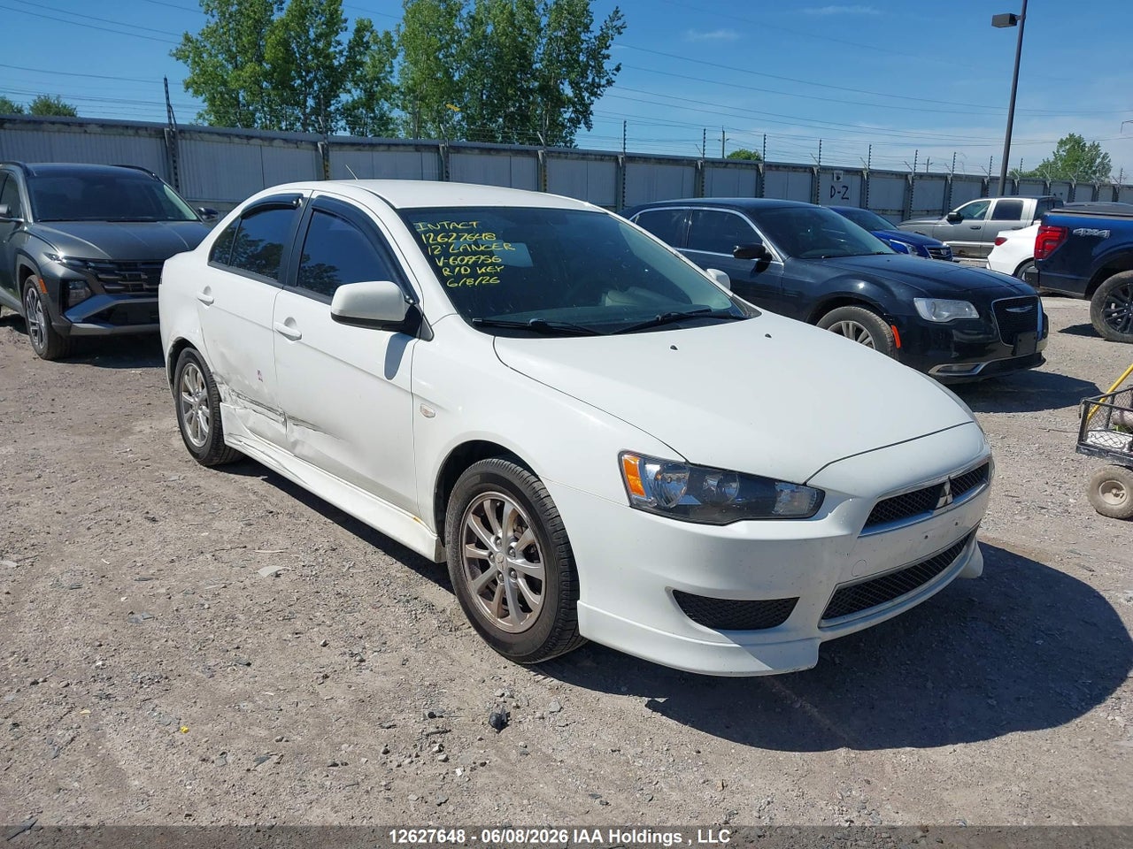 JA32V2FW9CU609956 · 2012 MITSUBISHI LANCER