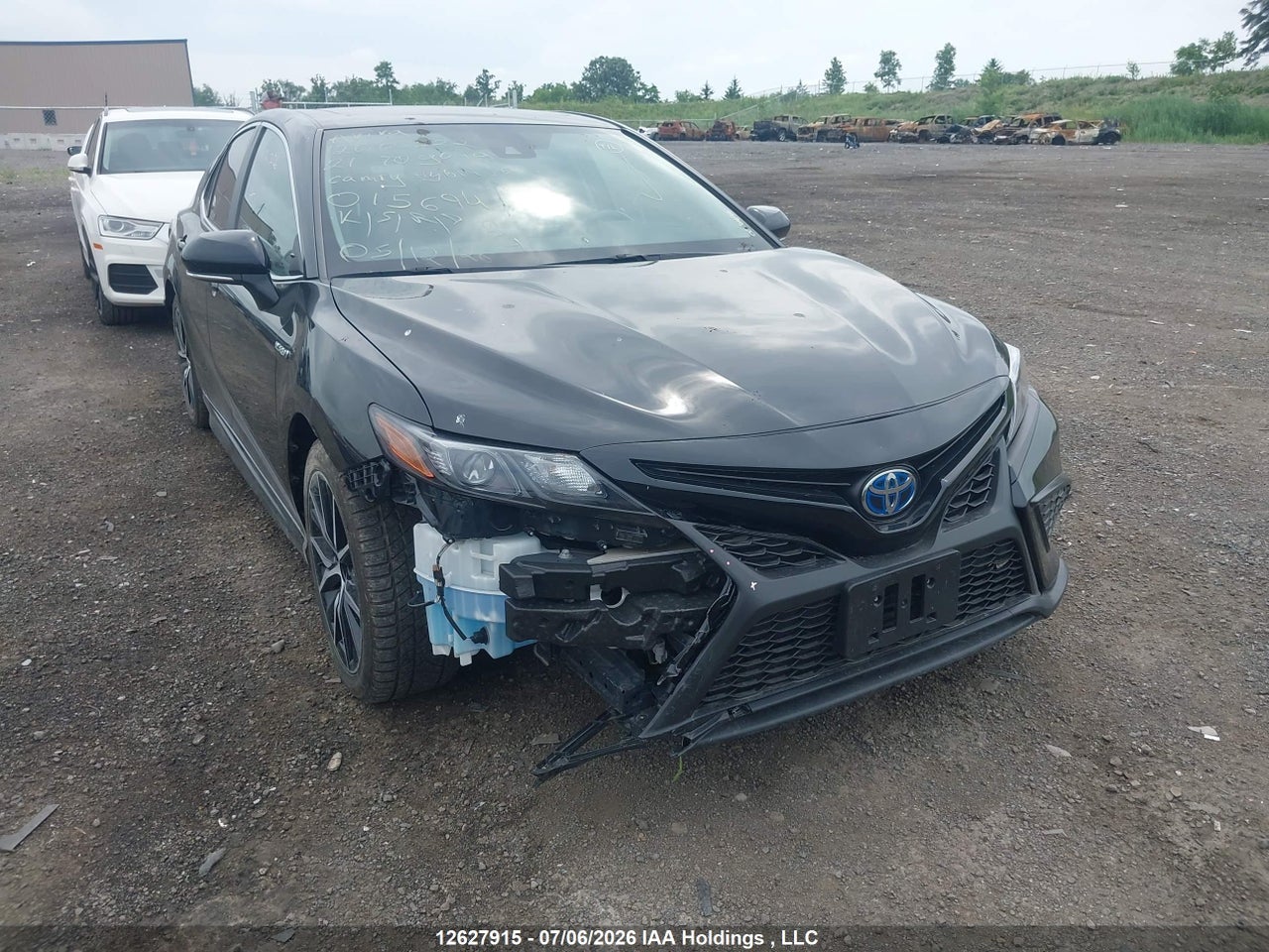 4T1B21HKXMU015694 · 2021 TOYOTA CAMRY HYBRID SE