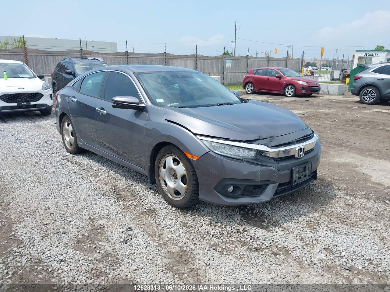 2HGFC1F90JH107724 · 2018 HONDA Civic touring