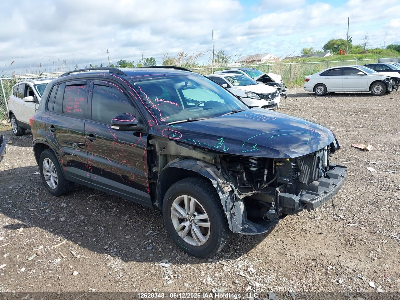 WVGKV3AX8EW529008 · 2014 VOLKSWAGEN TIGUAN S