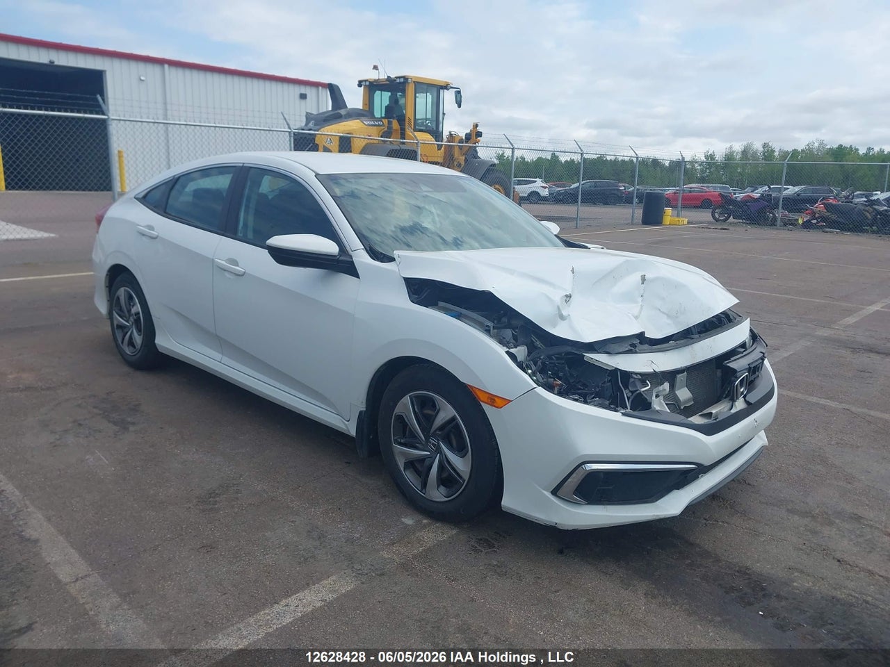 2HGFC2F57MH001276 · 2021 HONDA CIVIC LX