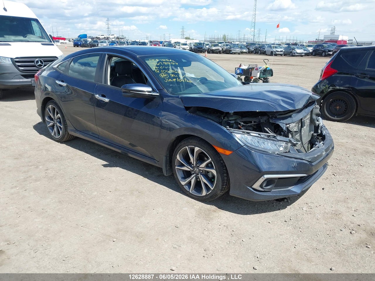 2HGFC1F91KH106566 · 2019 HONDA Civic touring