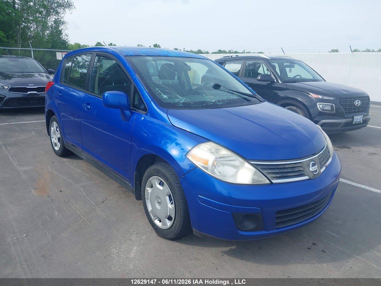3N1BC13E89L425899 · 2009 NISSAN VERSA S/SL