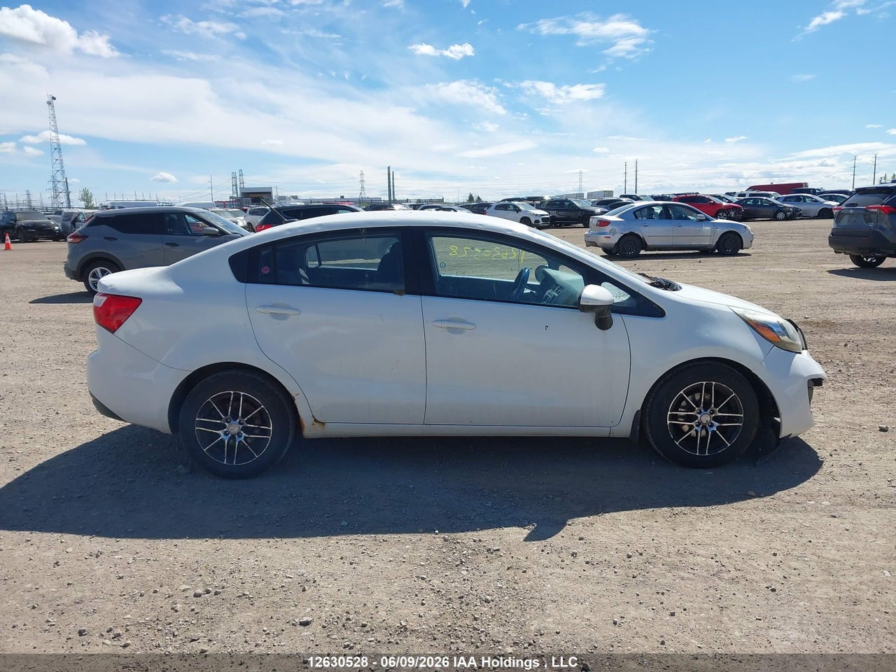 KNADM4A39E6337659 · 2014 KIA RIO · 12/17
