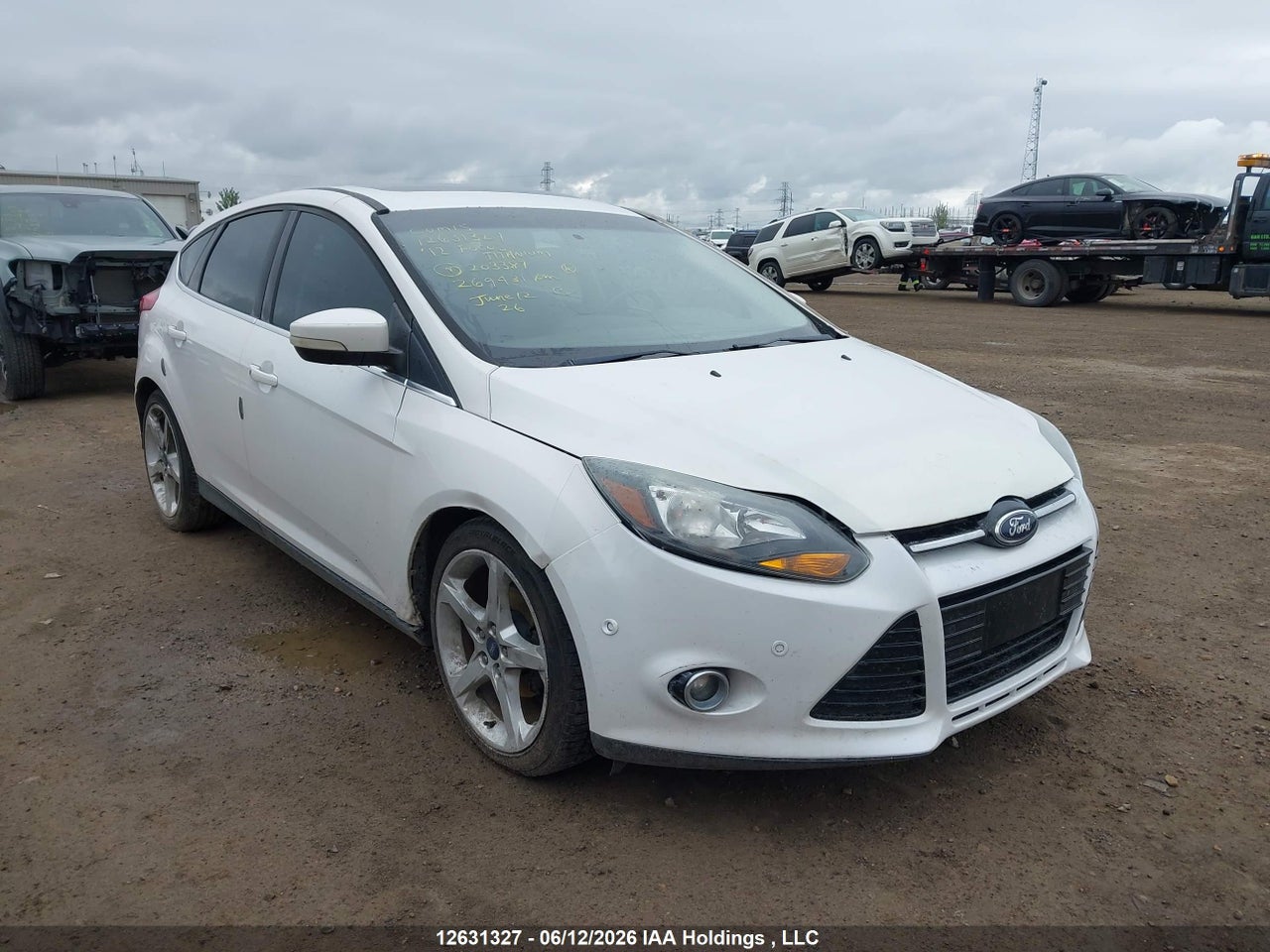 1FAHP3N27CL203387 · 2012 FORD FOCUS TITANIUM