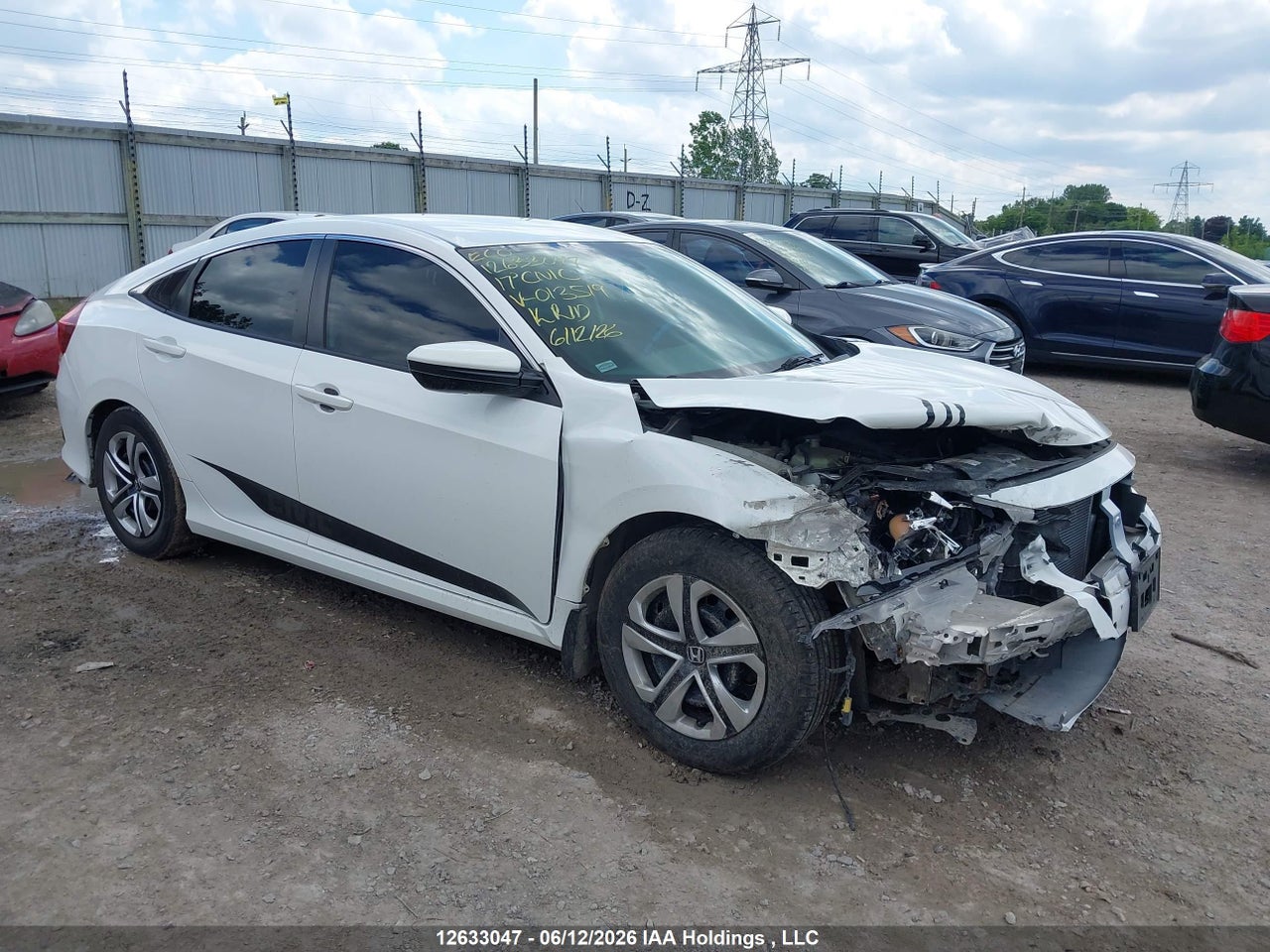 2HGFC2F54HH013519 · 2017 HONDA CIVIC LX