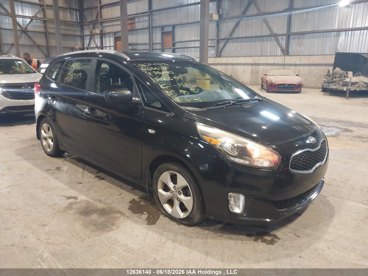 KNAHT8A37E7053159 · 2014 KIA RONDO