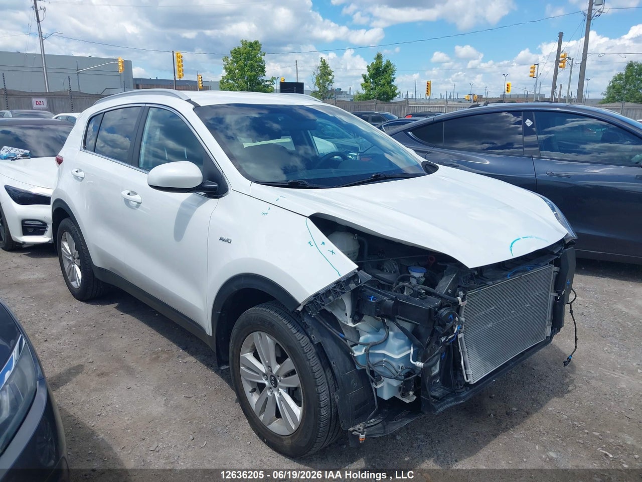 KNDPMCAC6K7614025 · 2019 KIA Sportage LX
