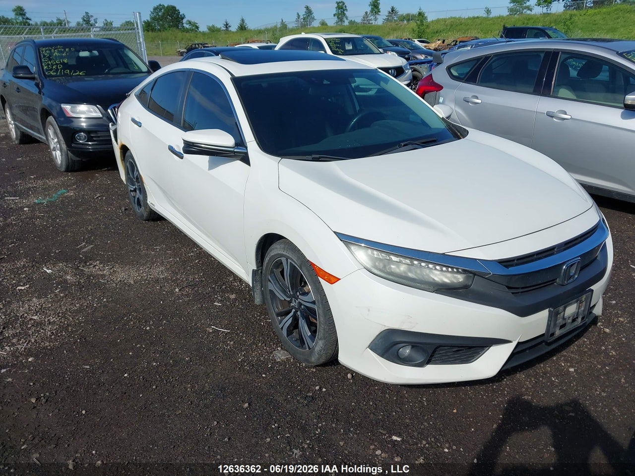 2HGFC1F97GH114629 · 2016 HONDA Civic touring